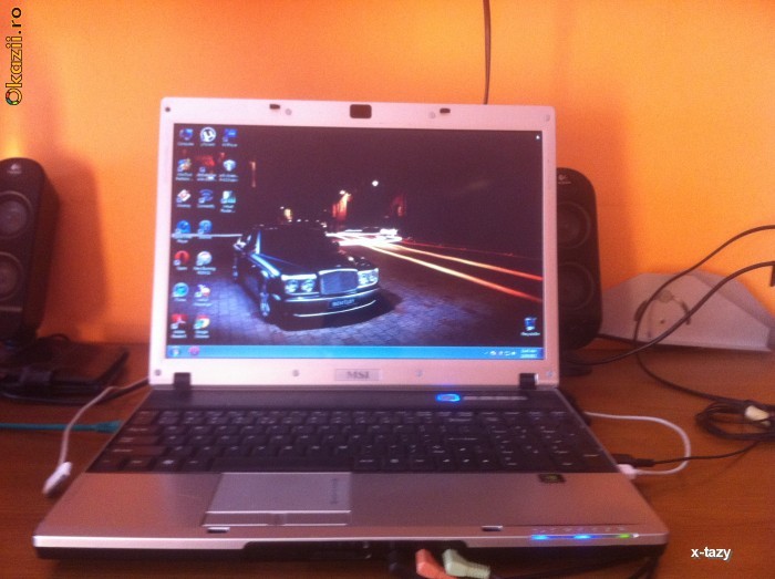 Vand\Schimb Laptop Msi M670 1.8ghz/2gb ram/500gb/ foto mare