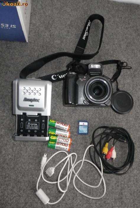 Canon Powershot S3 IS, plus foarte multe accesorii (trepied, geanta, husa, parasolare, card, filtre, lentile, acumulatori, incarcator) foto mare